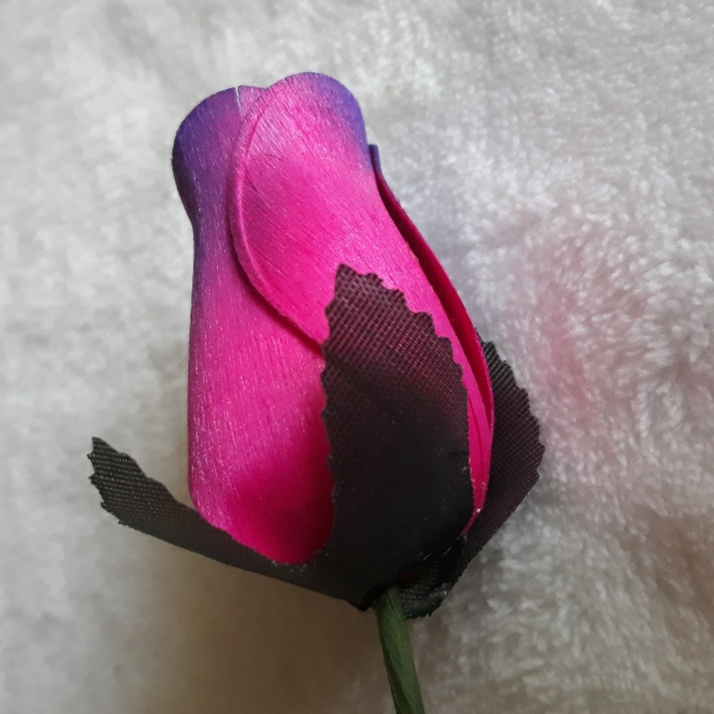 Wooden rose, pink and purple. 13 inches long.